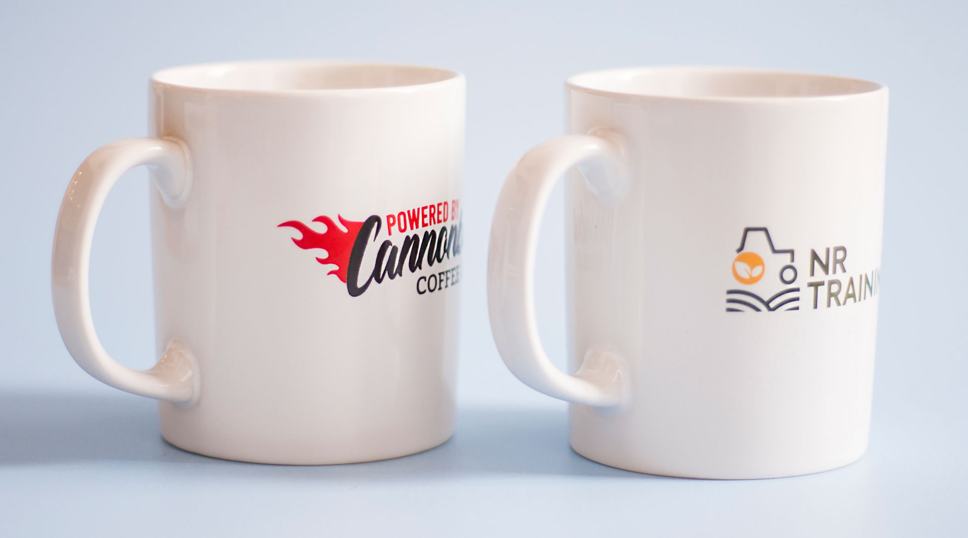 Cambridge printed promotional mugs from Prince William Pottery
